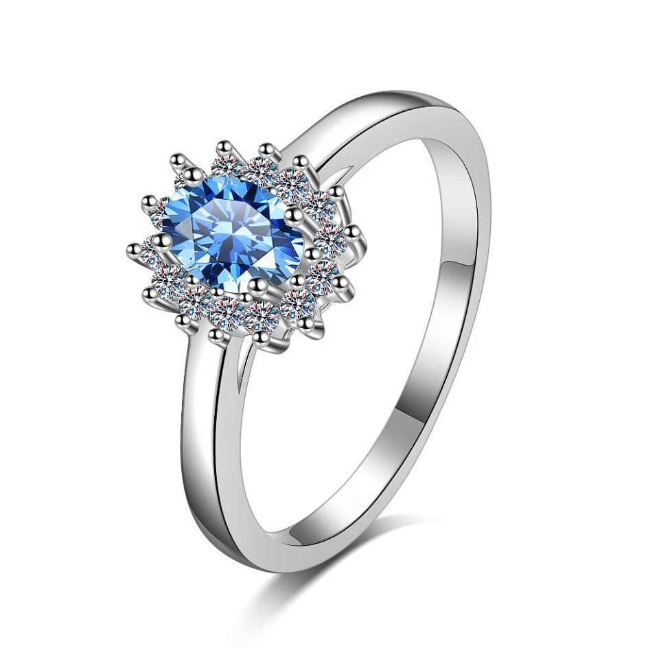 0.5ct Oval Blue Moissanite Sunburst Halo Ring